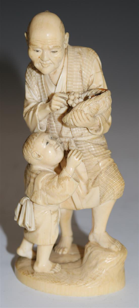 A Japanese ivory okimono, 17cms